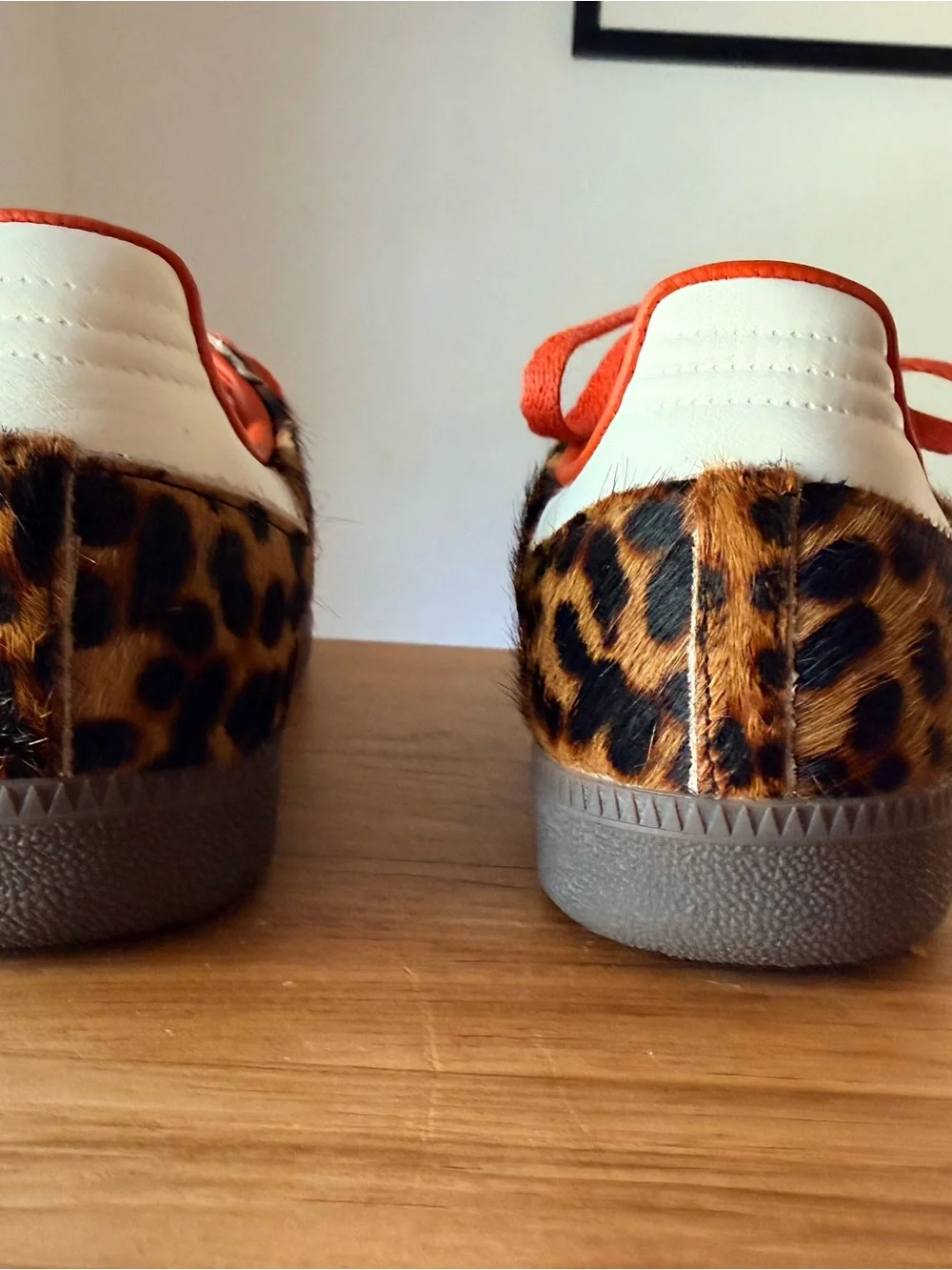 Adidas Originals samba sneakers in leopard print with red and white laces.